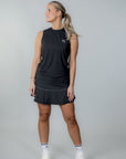 IZA Performance Skirt svart – padel- och tenniskjol med hög midja och längre modell