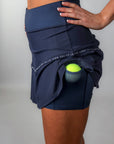Undershorts på IZA Skirt – långa och sitter på plats under spelet, med praktiska fickor för bollar