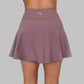 Bakvy av Maya Ribbed Skirt i dusty purple, detaljrik med tydlig visning av den inbyggda innerbyxans längd och passform.