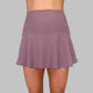 Frontvy av Maya Ribbed Skirt i dusty purple, visar kjolens eleganta höga midja och moderna ribbade design.